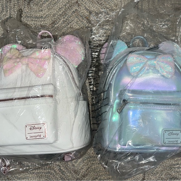 Loungefly Handbags - Loungefly White and Iridescent Mini Backpacks